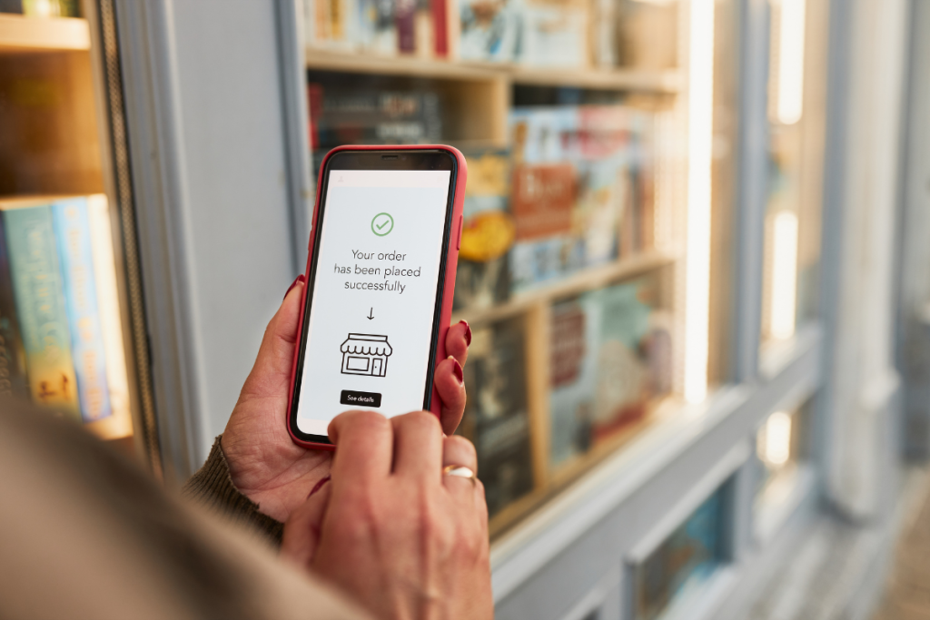 Phone showing an order confirmation screen after a successful holiday checkout